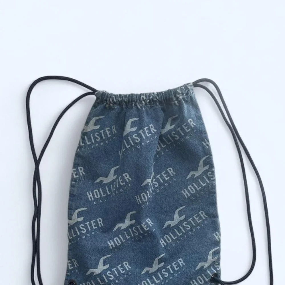 Hollister blue denim‎ drawstring logo bag